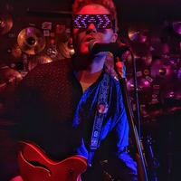 TCOSS photo of Alexi on LED visuals