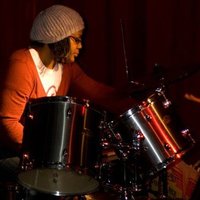 TCOSS photo of Lisa on drums